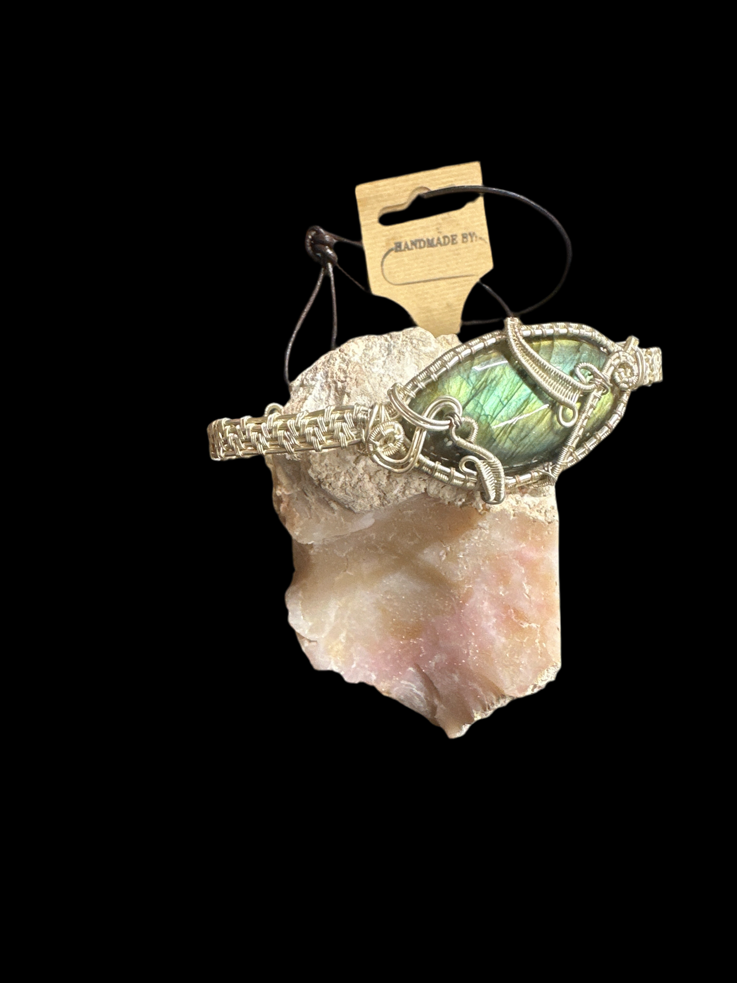 Intricate handcrafted wire-wrapping that highlights the stone’s natural beauty [ lot# L-B101 ]