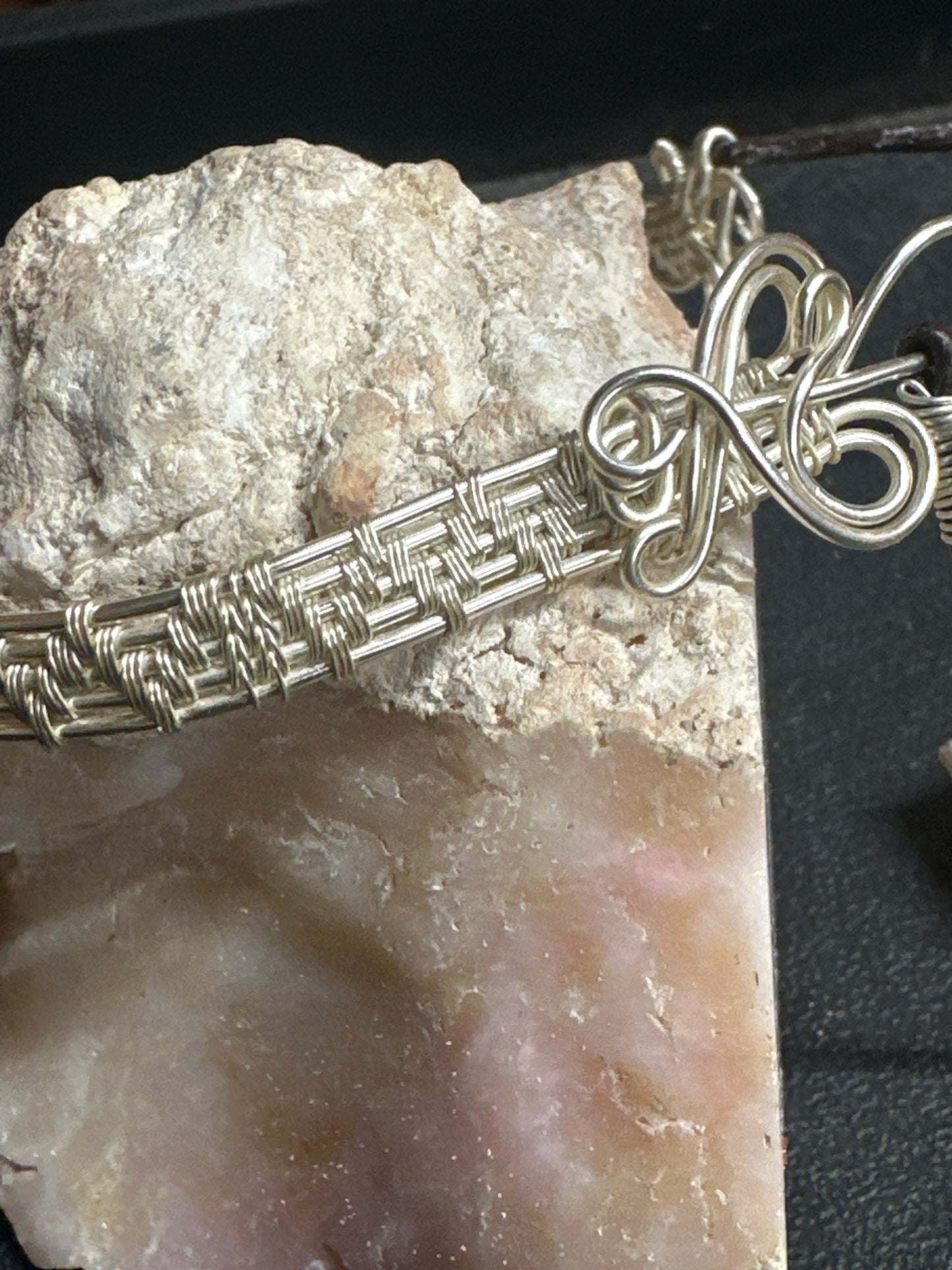 Intricate handcrafted wire-wrapping that highlights the stone’s natural beauty [ lot# L-B101 ]