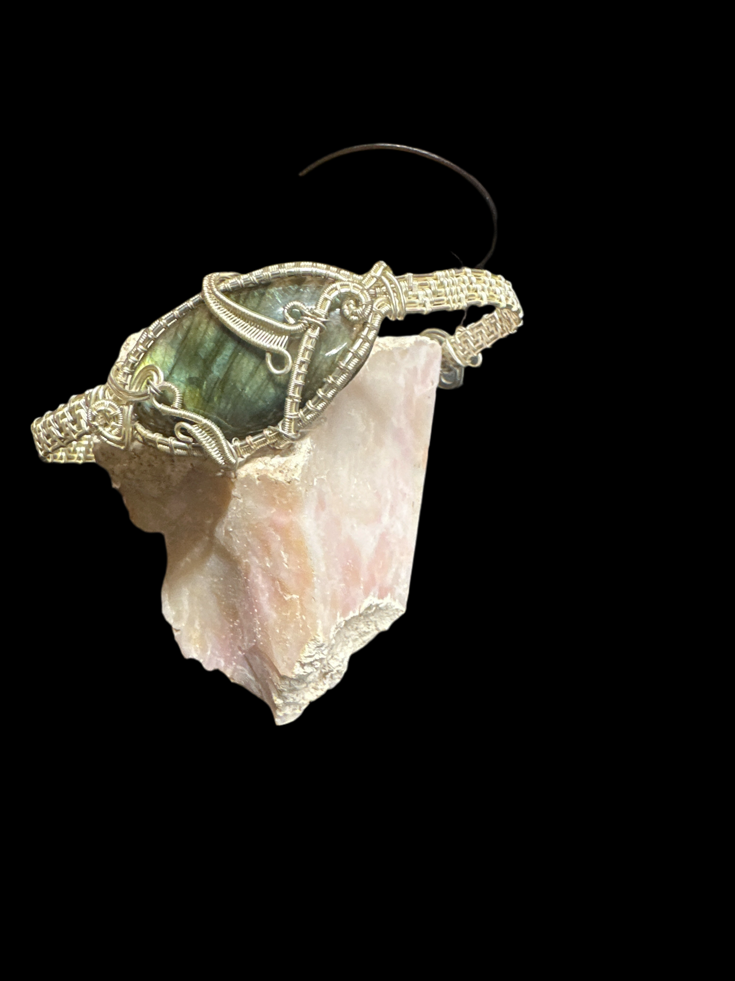 Intricate handcrafted wire-wrapping that highlights the stone’s natural beauty [ lot# L-B101 ]